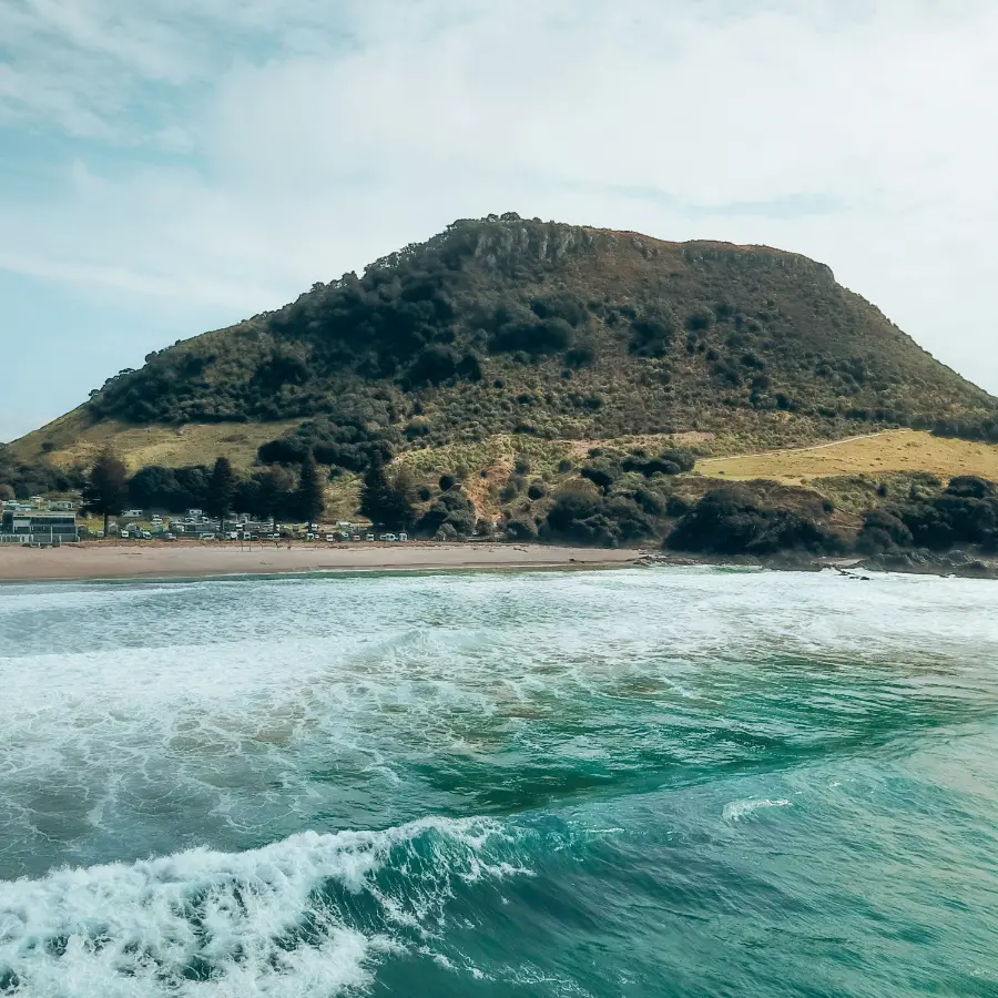 Mauao and Mount Maunganui main beach with rolling surf